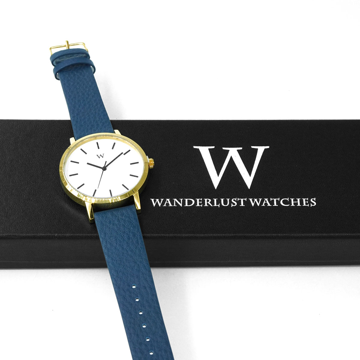 Gold Wristwatch with White Dial Blue Band  602860764193 UPC  - NULL